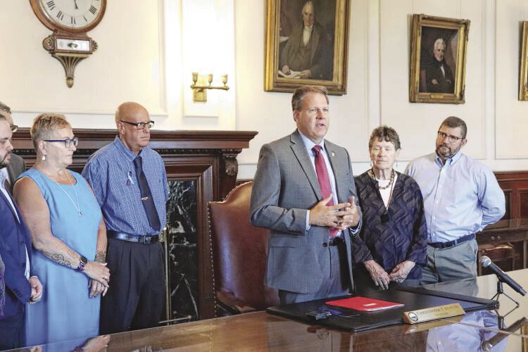 Governor signs law requiring student ID cards to have suicide prevention number